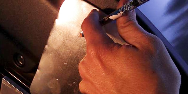Figure 11: Marking the Heat Shield to Attach to the Grill Hood
