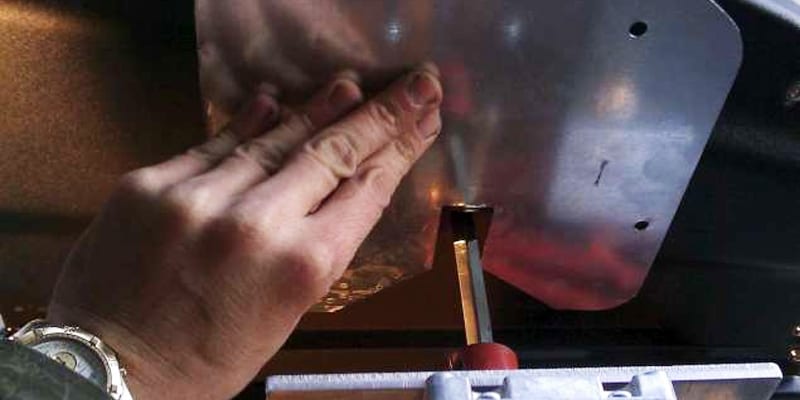 Figure 16: Marking the heat shield position on the grill hood