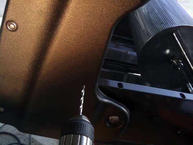 Figure 18: Drill the 4 places on the grill hood