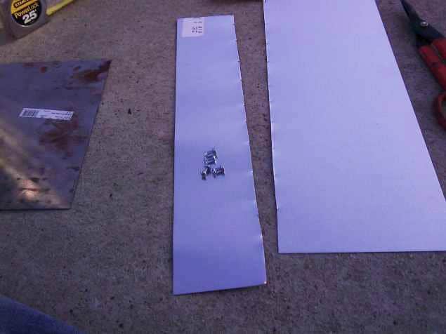 Figure 14: Finished Sheet Metal Piece and Hardware