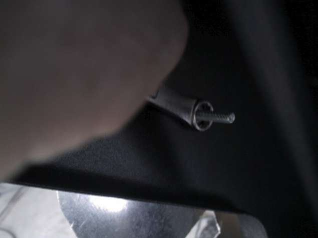 Figure 27: Tightening the Heat Shield Down