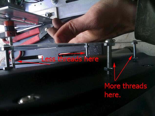 Figure 25: Adjusting the nuts to match the contour of the grill